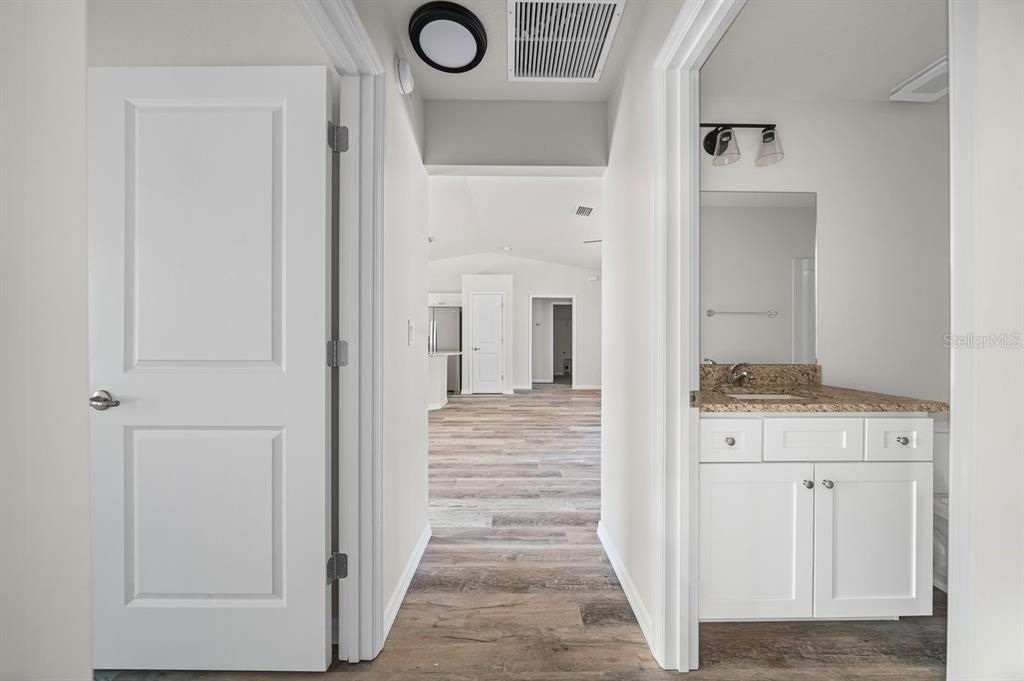8992 North Lisa Terrace Citrus Springs, FL 34433 - Photo 18 of 25 a view of a hallway with wooden floor