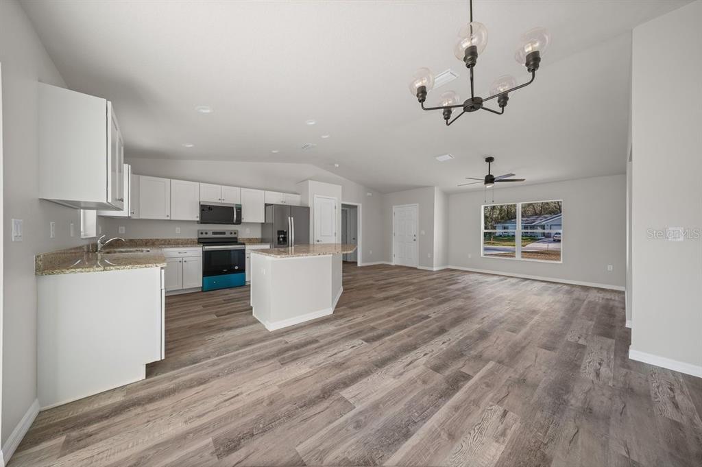 8992 North Lisa Terrace Citrus Springs, FL 34433 - Photo 9 of 25 a view of kitchen with sink and refrigerator