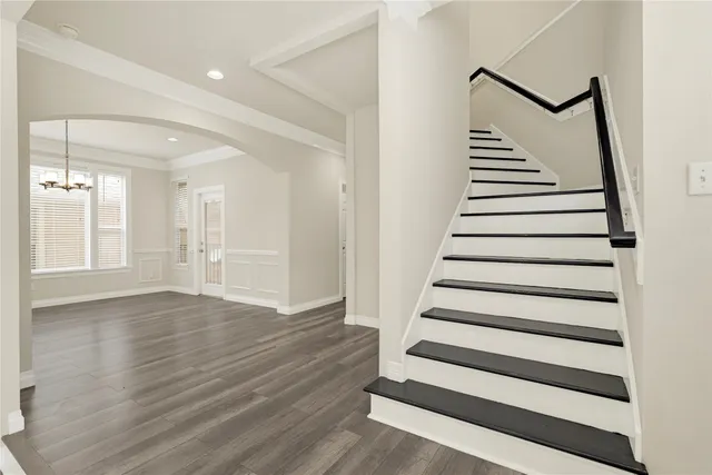 a view of entryway with wooden floor