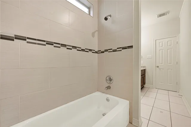 a bathroom with a bathtub