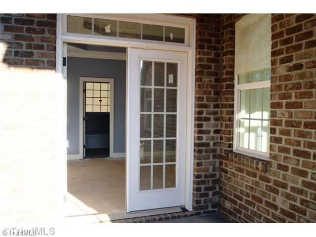 122 Idlewild Road Advance, NC 27006 - Photo 12 of 15 Master Bedroom. Master bedroom has French doors that lead out onto the wrap around porch!