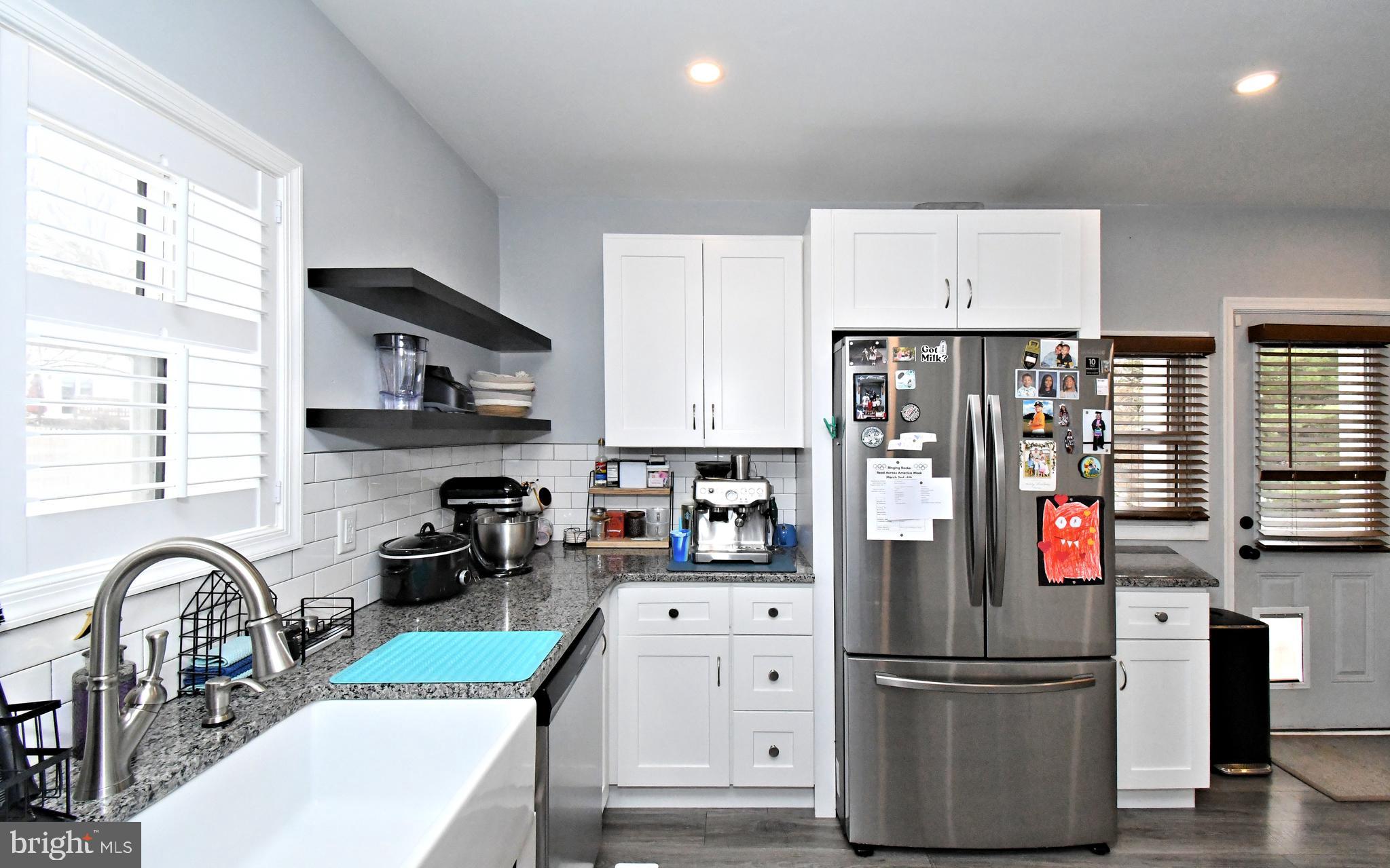 510 North Pleasantview Road Pottstown, PA 19464 - Photo 15 of 37 a kitchen with stainless steel appliances granite countertop a refrigerator and a stove top oven