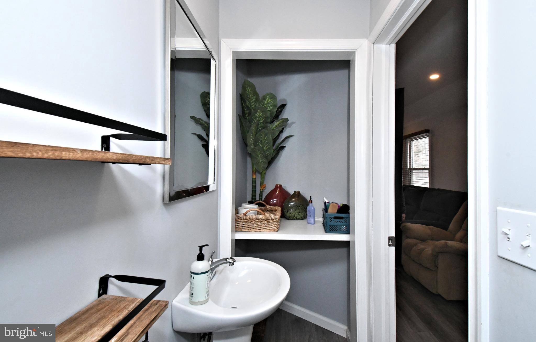 510 North Pleasantview Road Pottstown, PA 19464 - Photo 20 of 37 a bathroom with a sink and a mirror