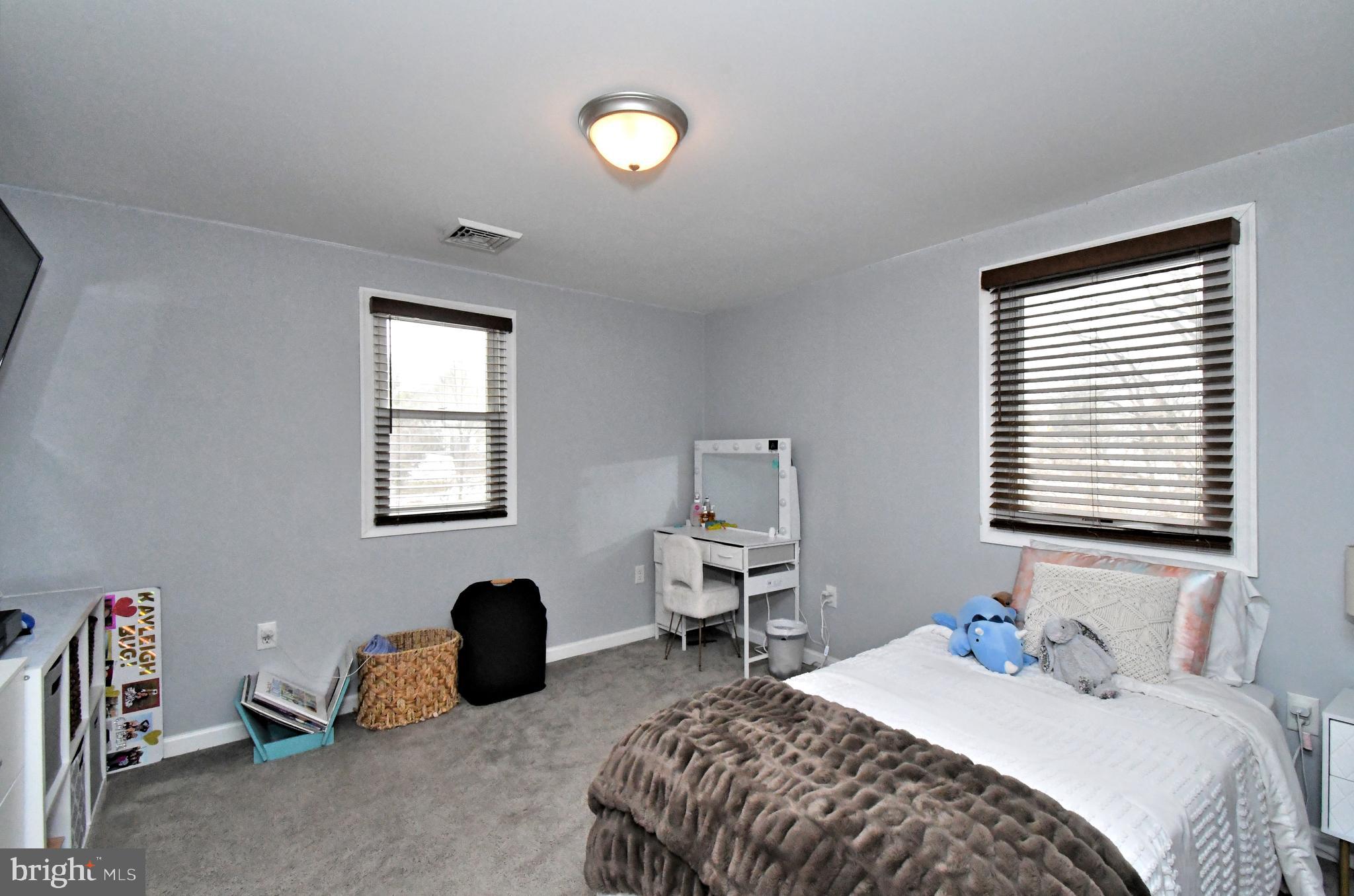 510 North Pleasantview Road Pottstown, PA 19464 - Photo 27 of 37 a bedroom with a bed and a window