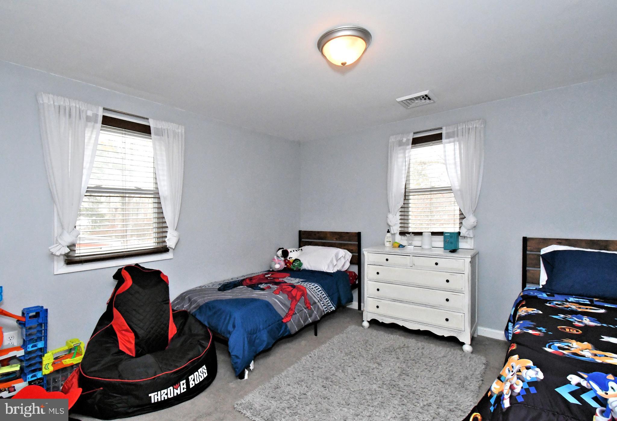 510 North Pleasantview Road Pottstown, PA 19464 - Photo 29 of 37 a bedroom with furniture and a window