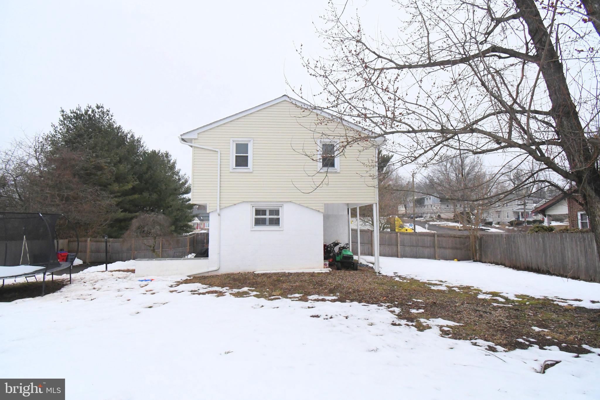 510 North Pleasantview Road Pottstown, PA 19464 - Photo 33 of 37 a view of a white house with a snow on the road