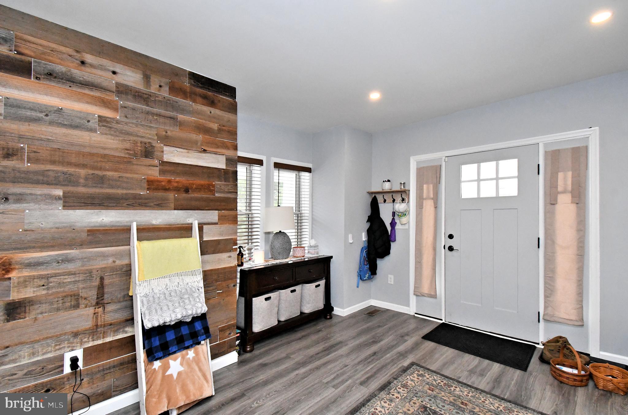 510 North Pleasantview Road Pottstown, PA 19464 - Photo 8 of 37 a living room with furniture and a wooden floor