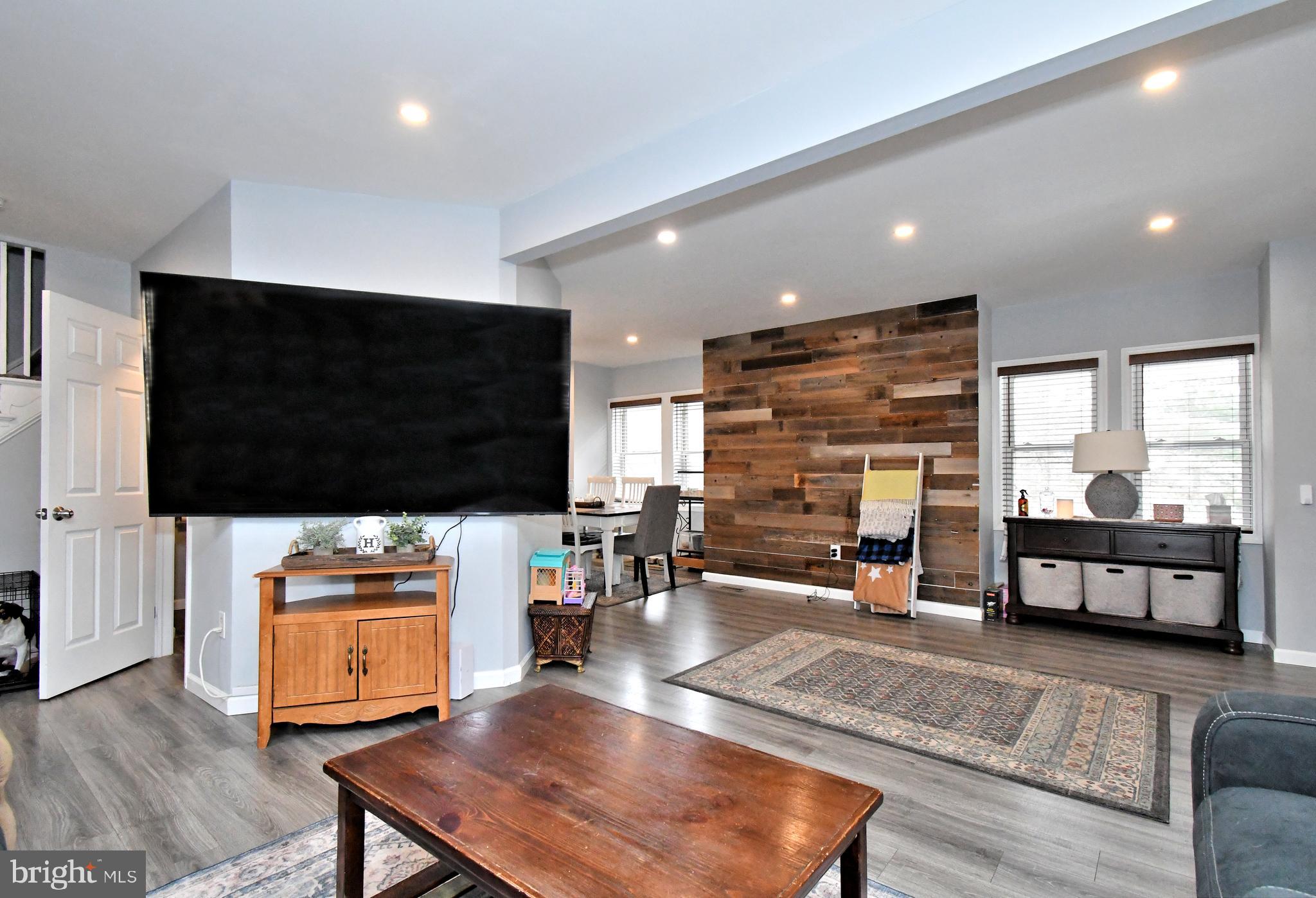 510 North Pleasantview Road Pottstown, PA 19464 - Photo 10 of 37 a living room with fireplace furniture and a flat screen tv