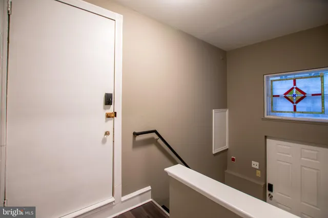 a bathroom with a shower and a toilet