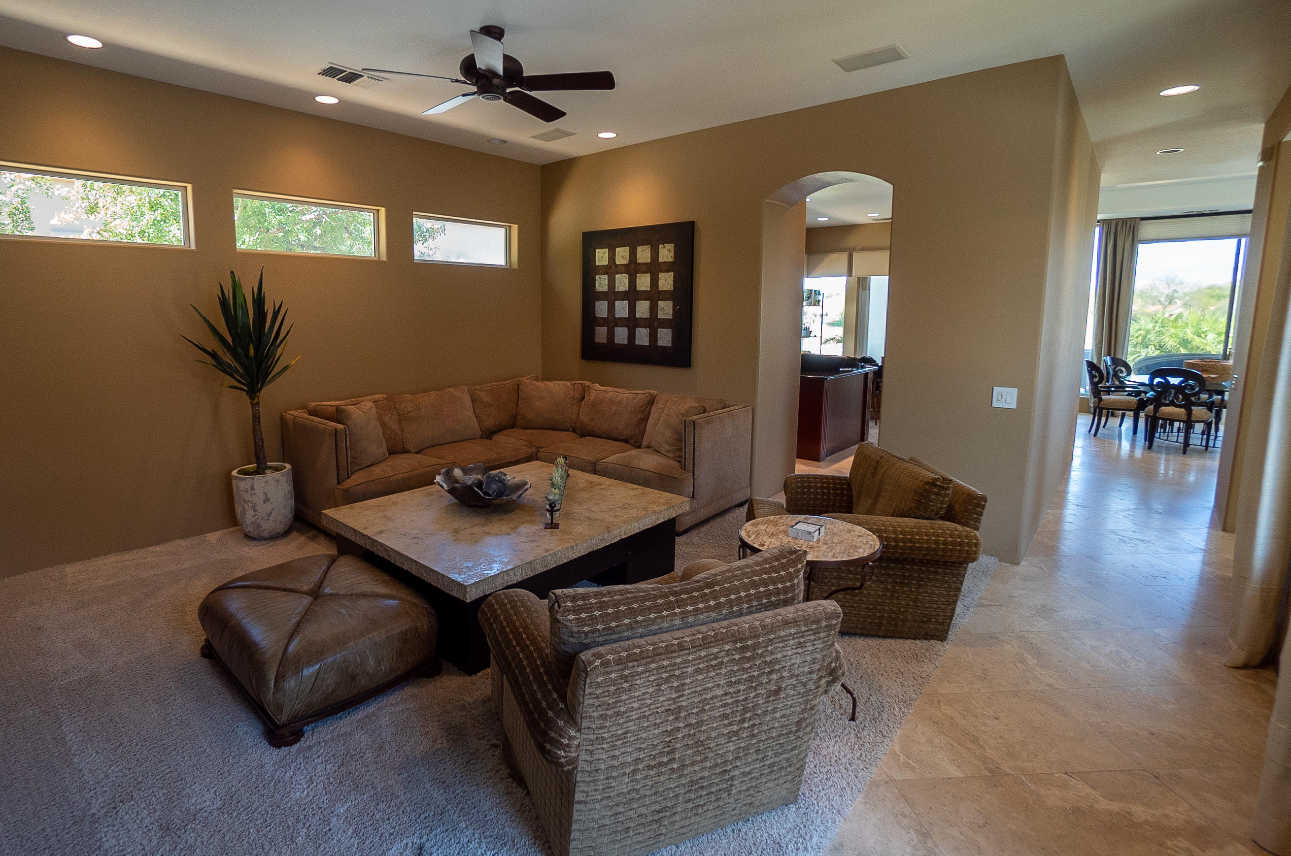 144 Loch Lomond Road Rancho Mirage, CA 92270 - Photo 16 of 28 a living room with furniture and a wooden floor