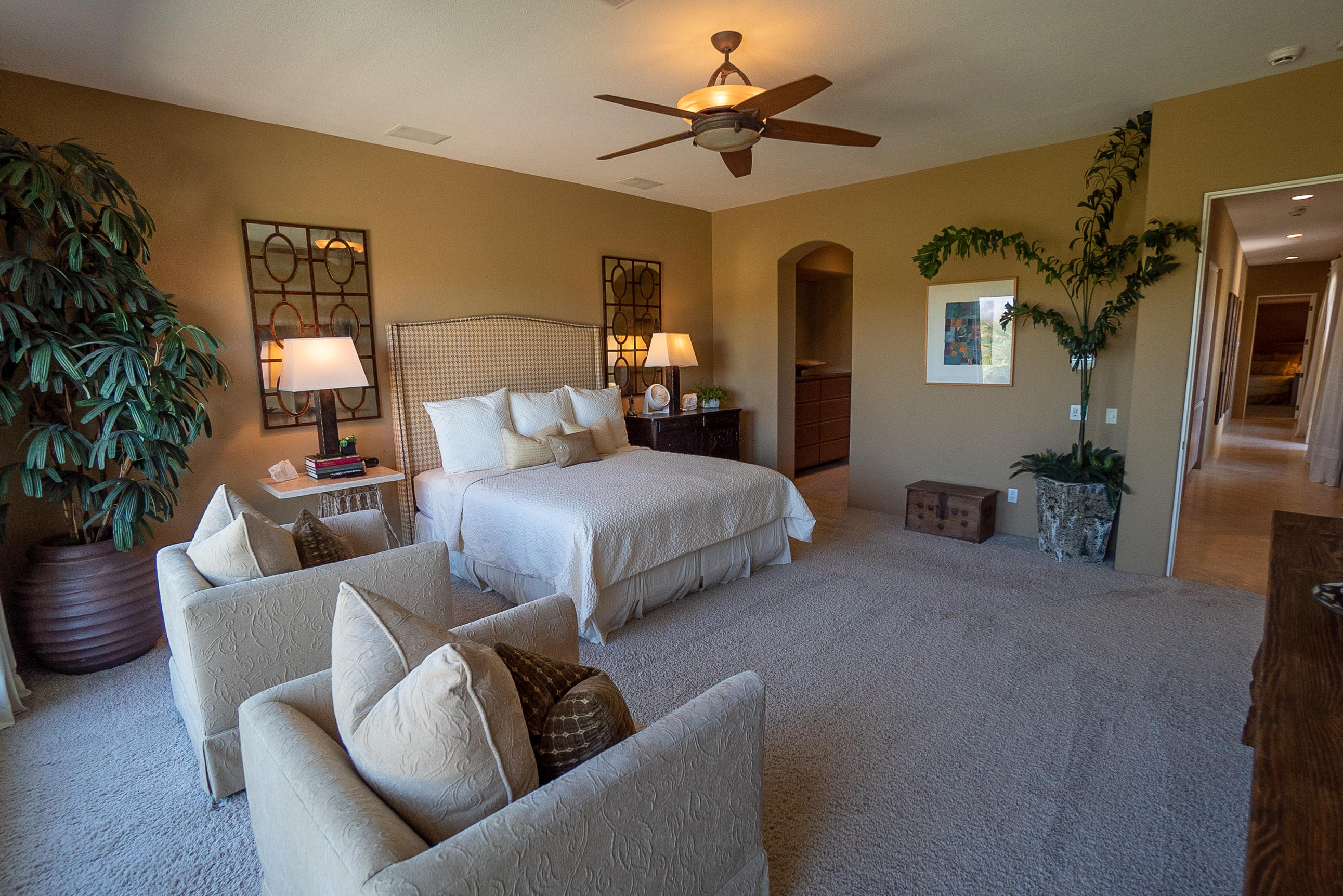 144 Loch Lomond Road Rancho Mirage, CA 92270 - Photo 19 of 28 a bedroom with furniture and a ceiling fan