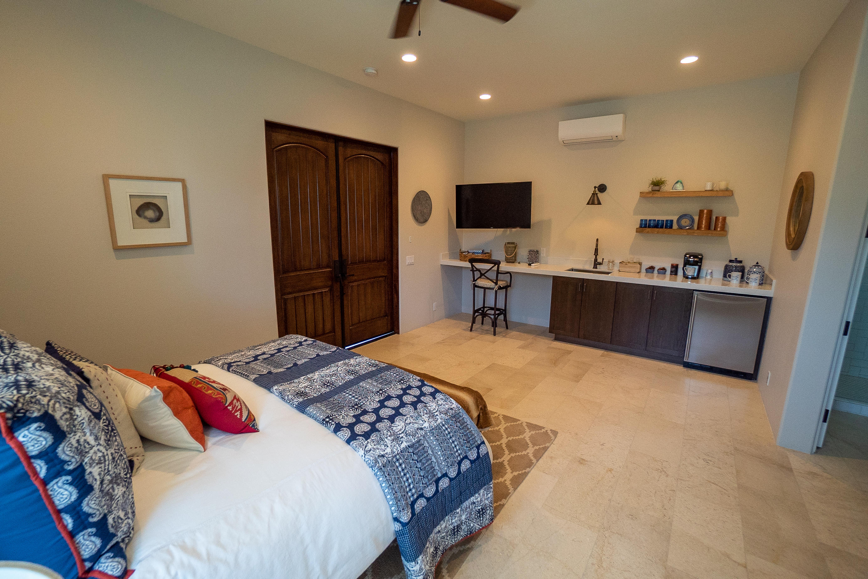 144 Loch Lomond Road Rancho Mirage, CA 92270 - Photo 27 of 28 a bedroom with a bed and a flat screen tv