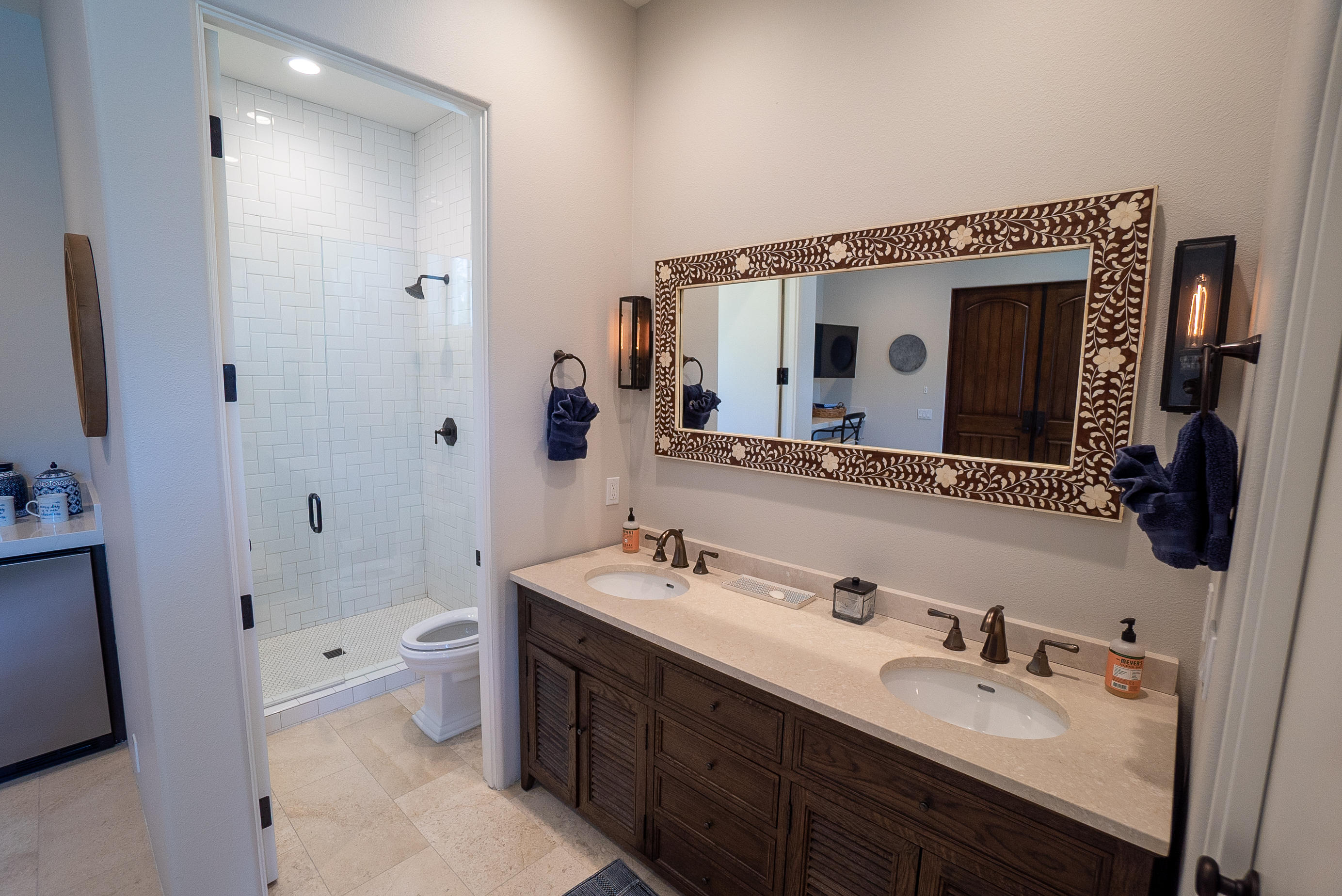 144 Loch Lomond Road Rancho Mirage, CA 92270 - Photo 28 of 28 a bathroom with a double vanity sink mirror double and bathtub