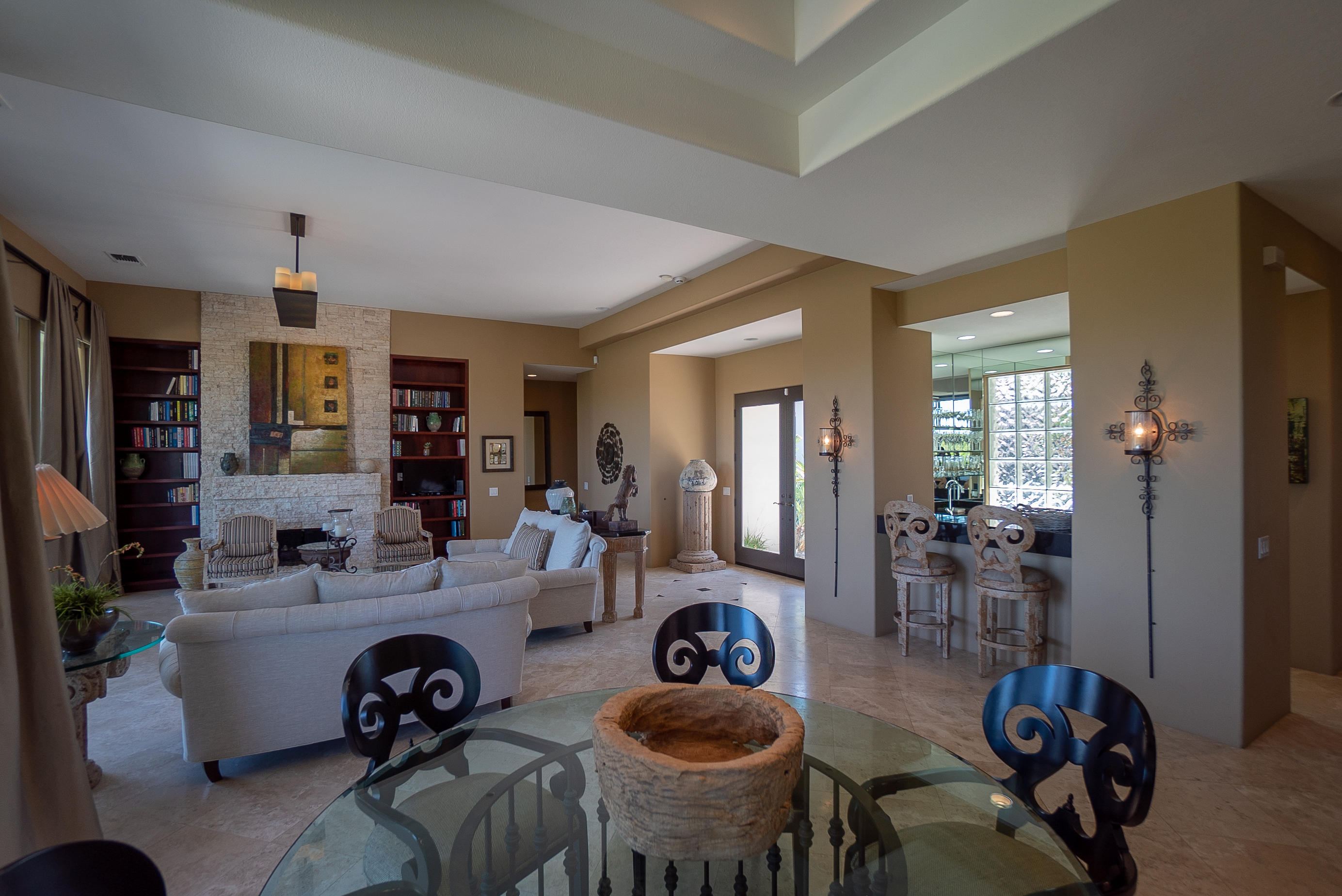 144 Loch Lomond Road Rancho Mirage, CA 92270 - Photo 9 of 28 a living room with furniture a dining table and chairs