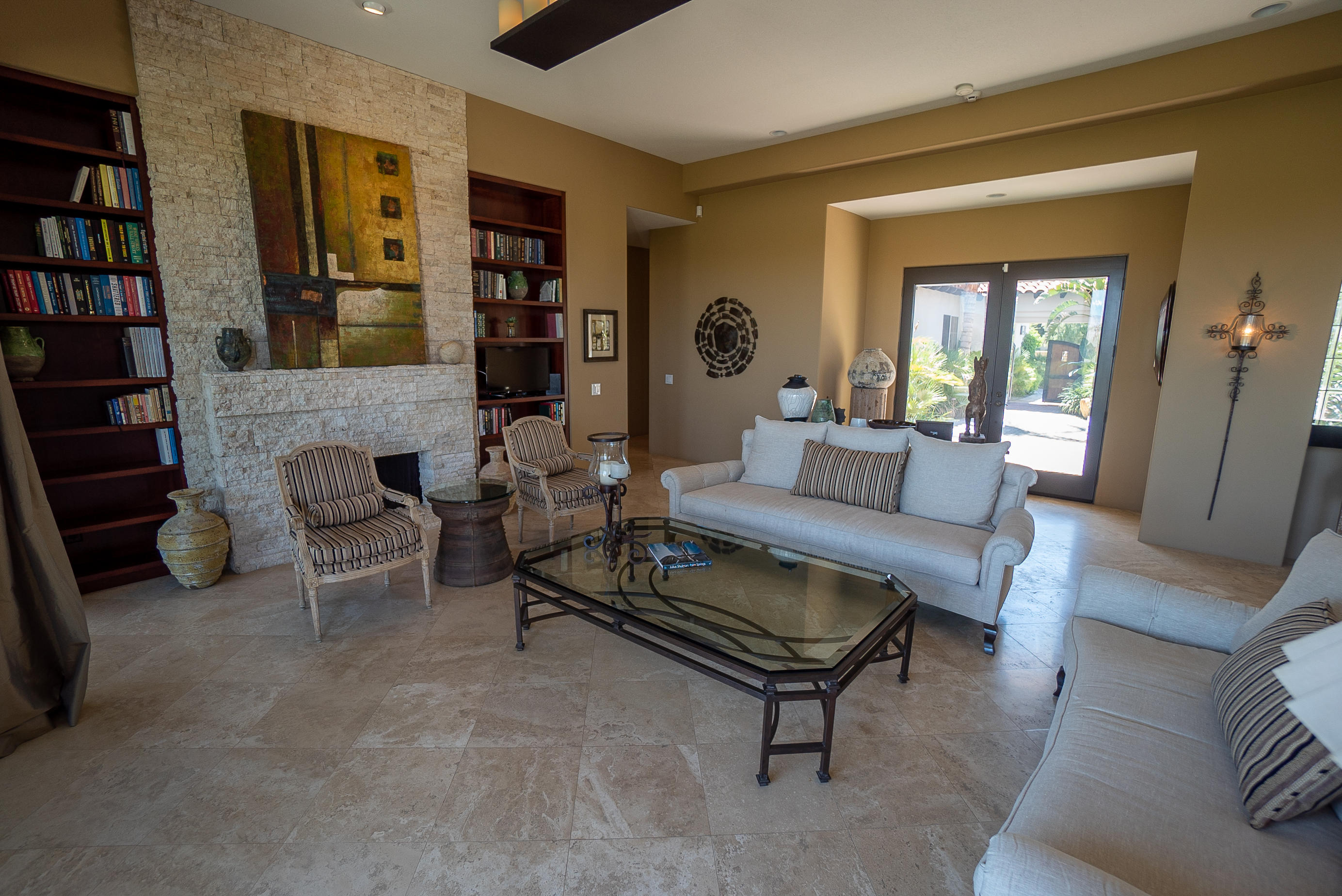 144 Loch Lomond Road Rancho Mirage, CA 92270 - Photo 10 of 28 a living room with furniture and a rug