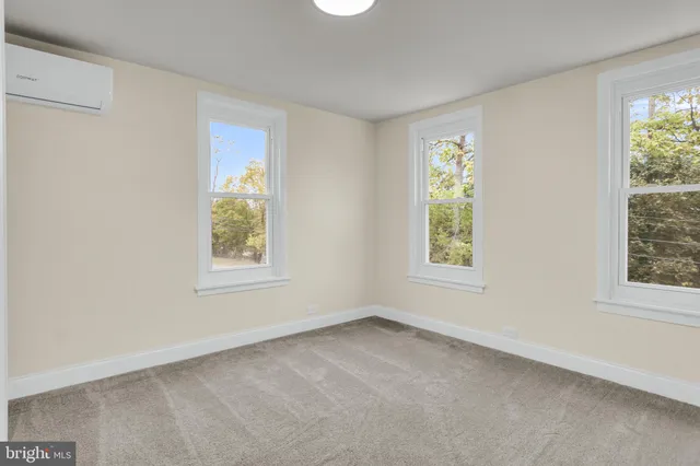 an empty room with windows