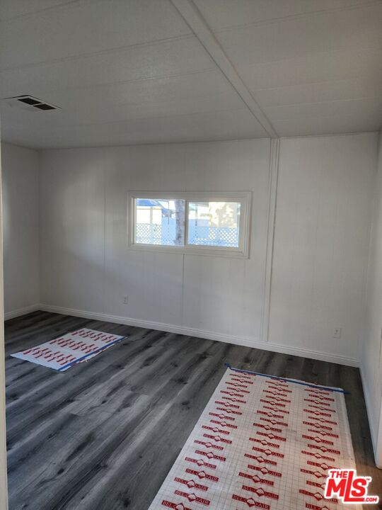 17700 South Avalon Boulevard, Unit 221 Carson, CA 90746 - Photo 5 of 14 a view of an empty room and window