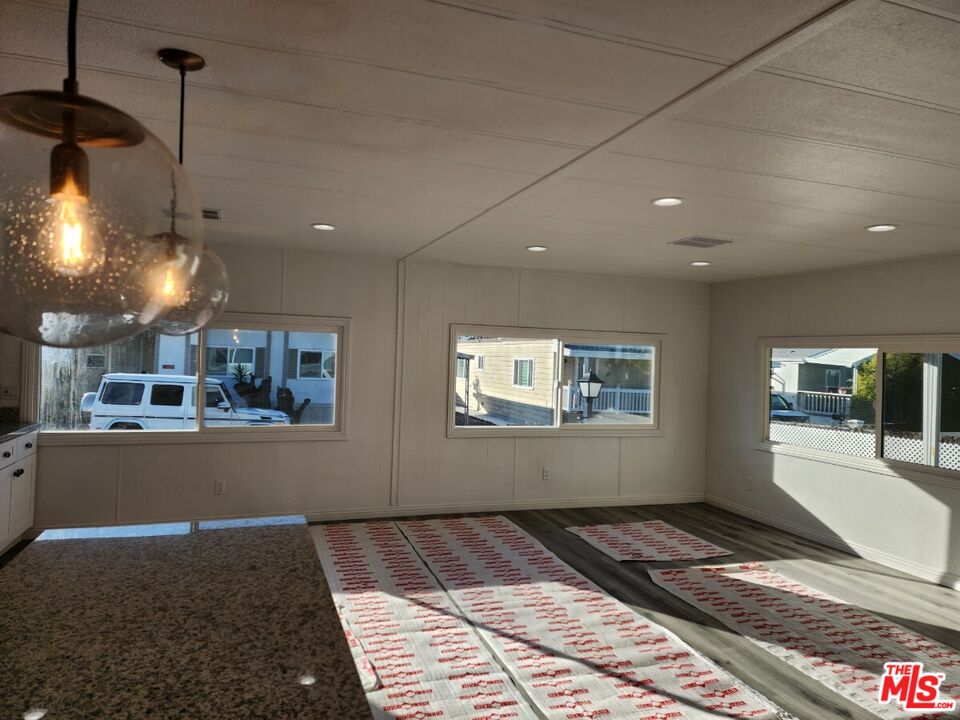 17700 South Avalon Boulevard, Unit 221 Carson, CA 90746 - Photo 7 of 14 a view of a center island in the kitchen