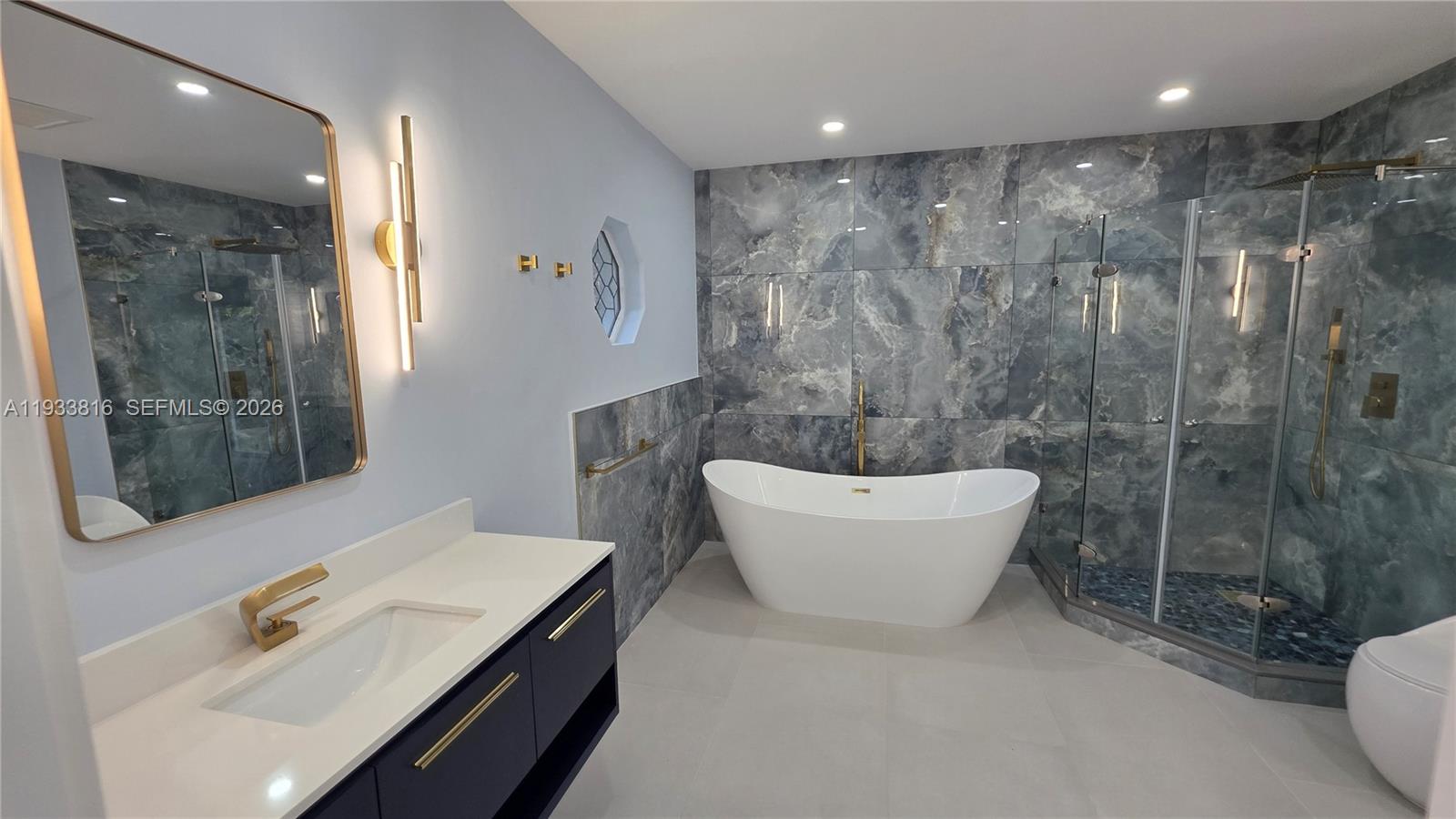 10540 Southwest 125th Street Miami, FL 33176 - Photo 13 of 31 a bathroom with a sink and a mirror