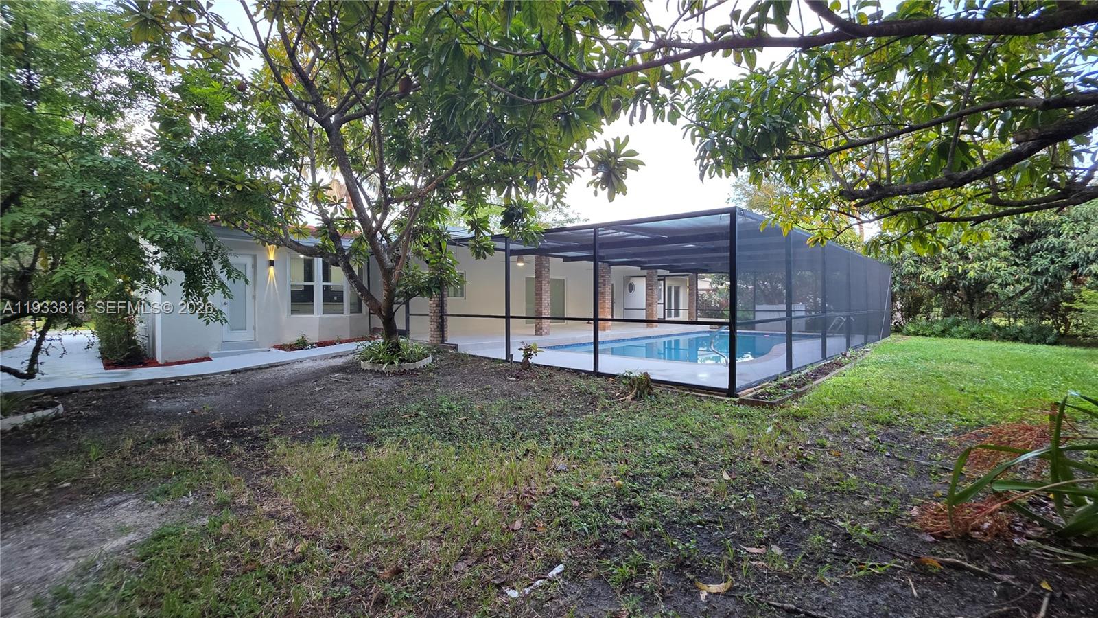 10540 Southwest 125th Street Miami, FL 33176 - Photo 23 of 31 a view of backyard with green space