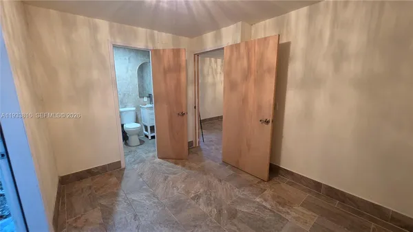 a view of a room with an shower door