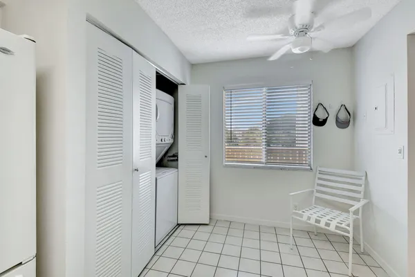 a view of an empty room with windows