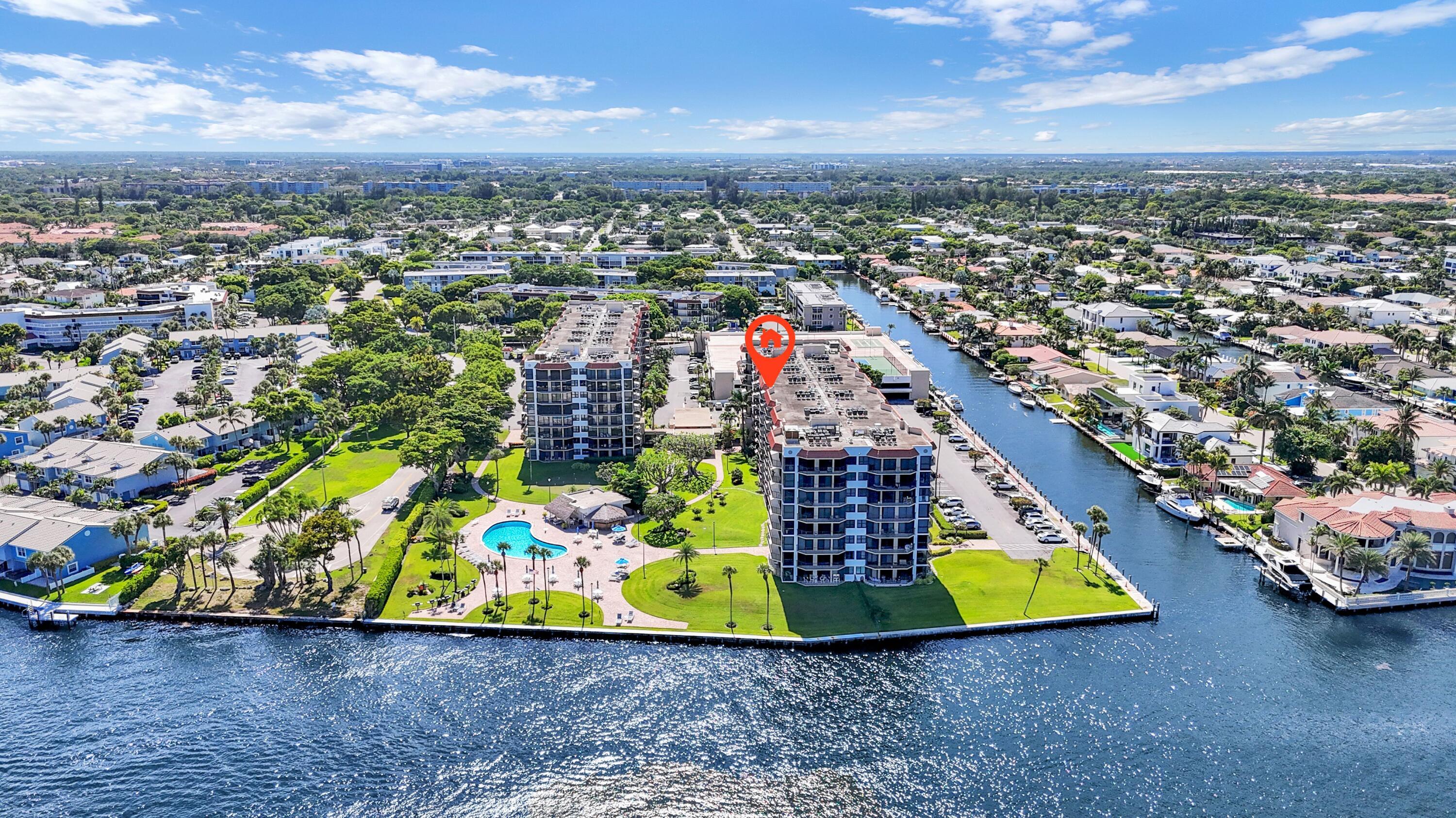 899 Jeffery Street, Unit 809 Boca Raton, FL 33487 - Photo 44 of 96 an aerial view of a house with a garden and lake view