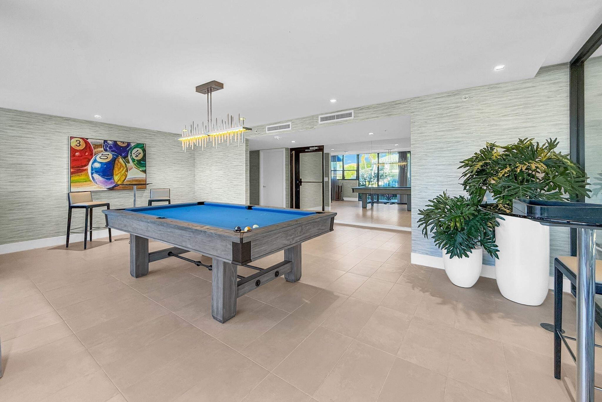 899 Jeffery Street, Unit 809 Boca Raton, FL 33487 - Photo 80 of 96 a room with furniture and a potted plant