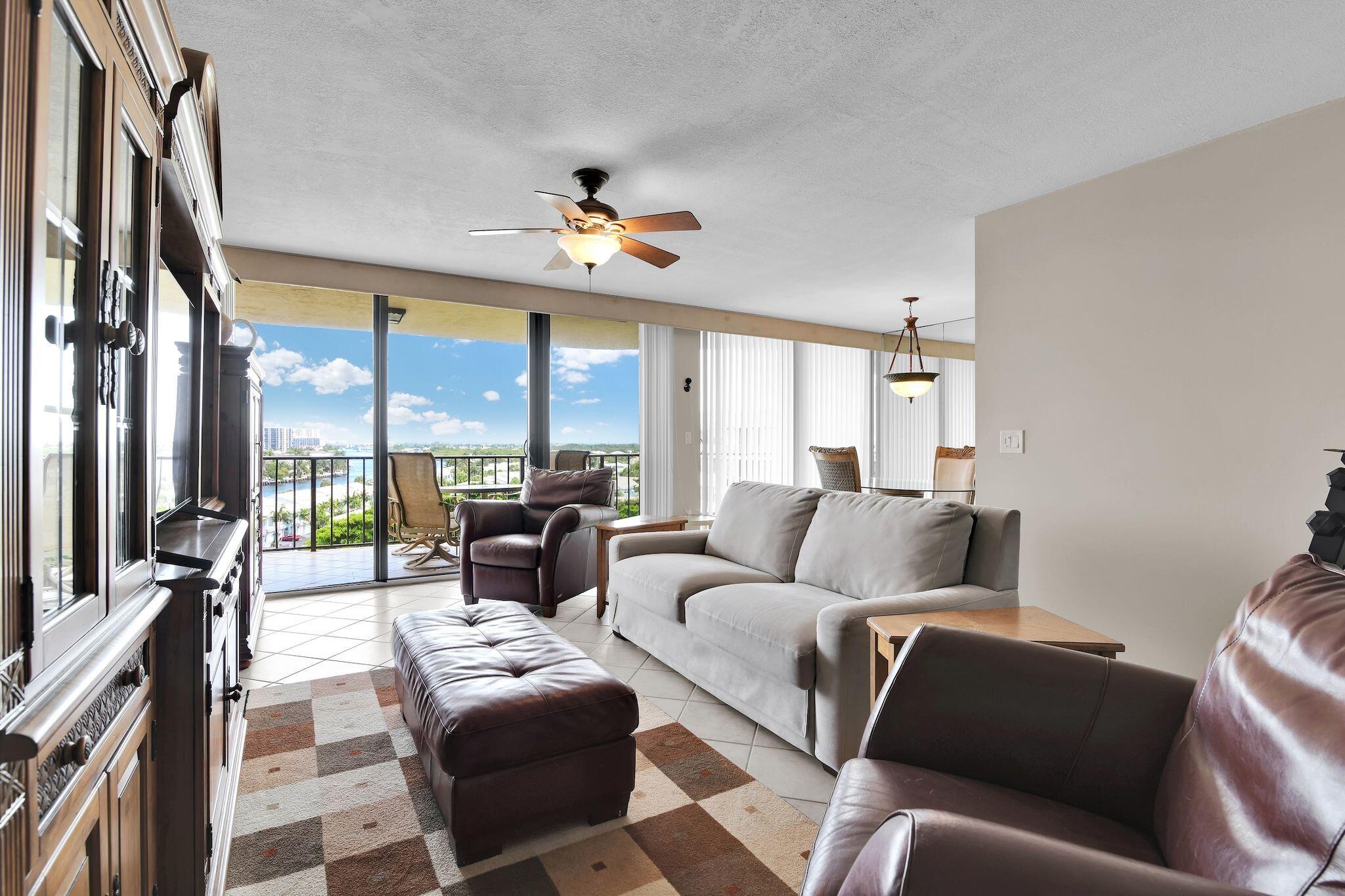 899 Jeffery Street, Unit 809 Boca Raton, FL 33487 - Photo 8 of 96 a living room with furniture and a large window