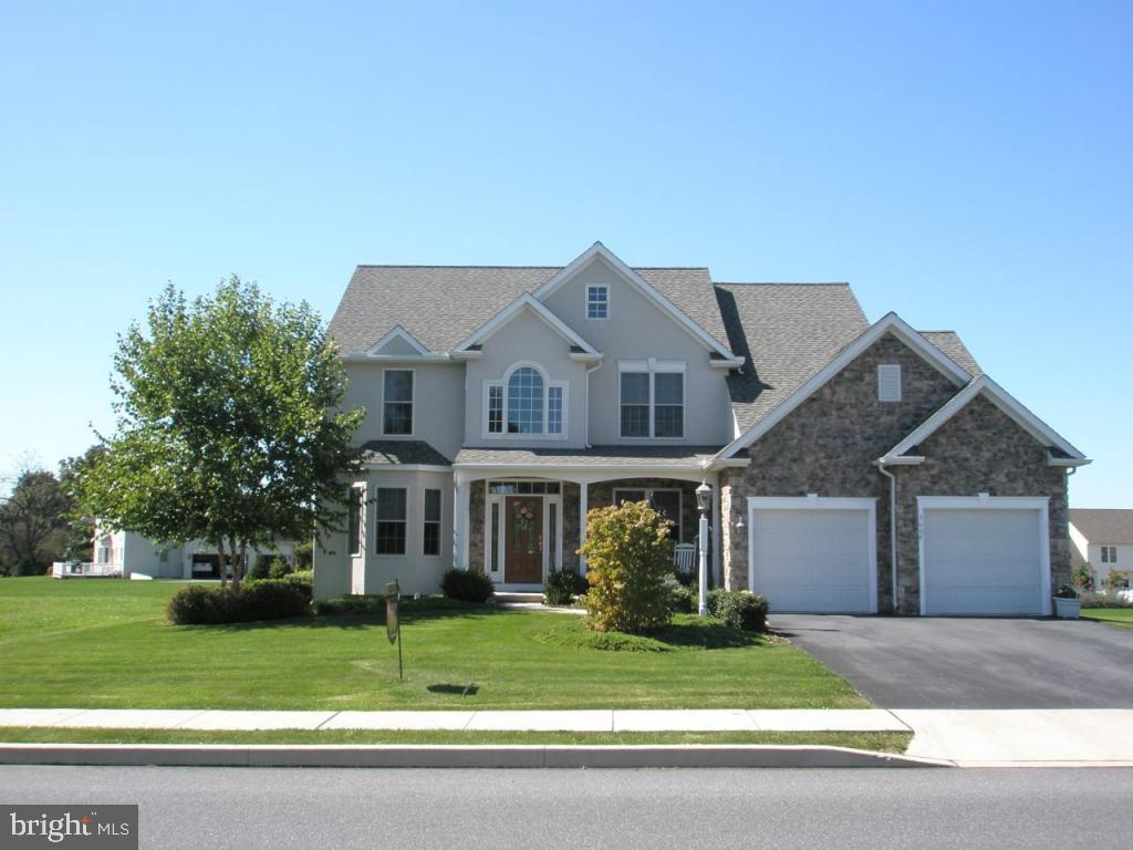 3008 Weaver Road Lititz, PA 17543 - Photo 1 of 12 a front view of a house with a yard
