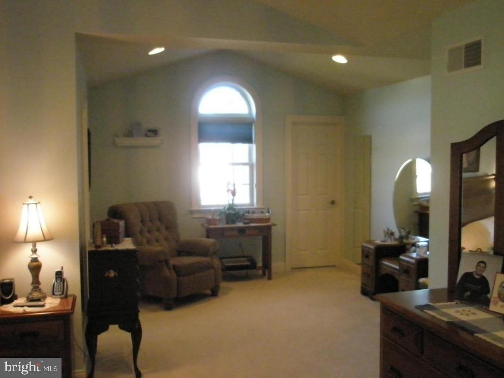3008 Weaver Road Lititz, PA 17543 - Photo 9 of 12 a living room with furniture and a fireplace