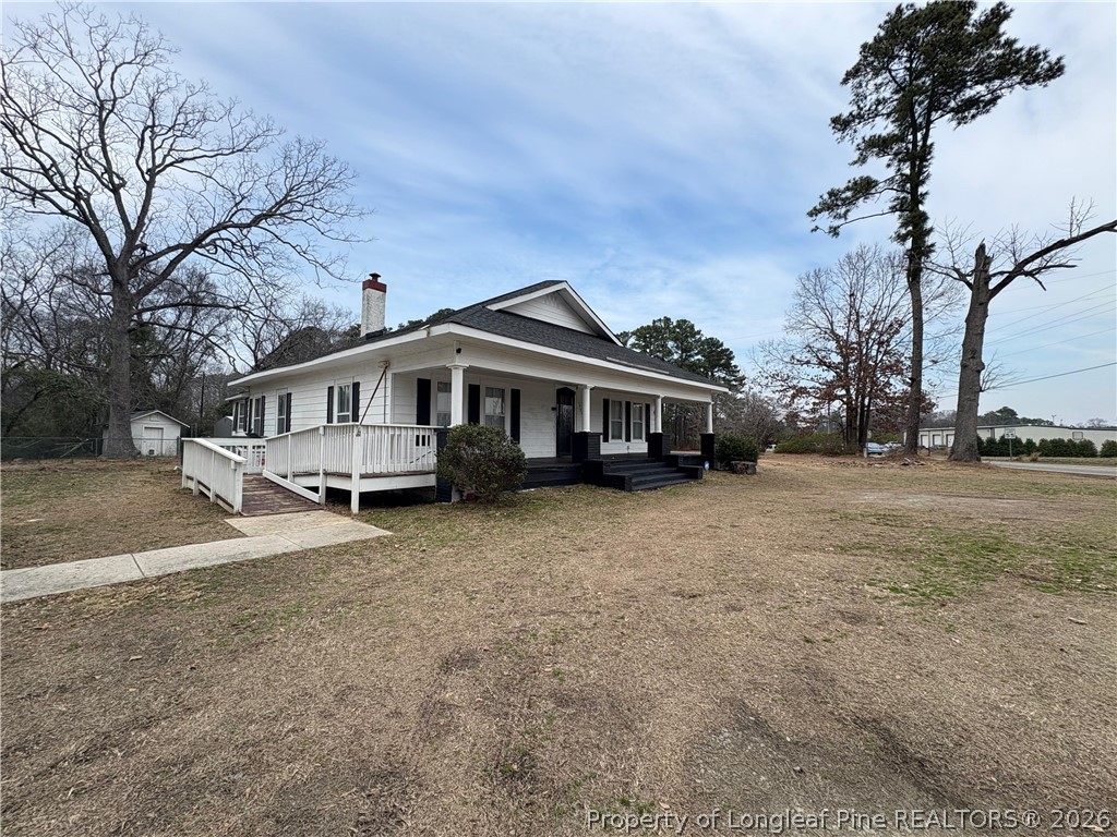 3174 Lindsay Road Raeford, NC 28376 - Photo 4 of 28 a view of a house with a yard