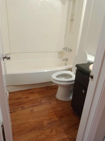 9806 Roxanna Drive, Unit C Austin, TX 78748 - Photo 4 of 6 a bathroom with a toilet and a shower