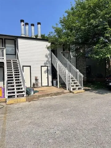 a view of a house with a garage