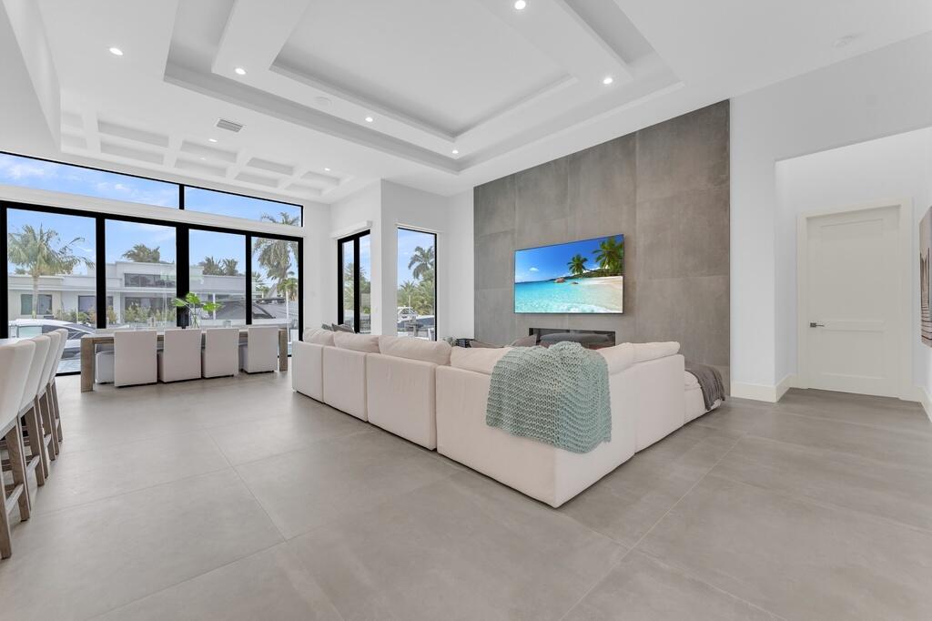 923 Eve Street Delray Beach, FL 33483 - Photo 11 of 69 a living room with furniture and a large window