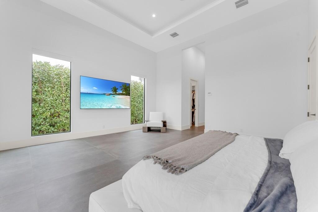 923 Eve Street Delray Beach, FL 33483 - Photo 40 of 69 a bathroom with a sink and a mirror