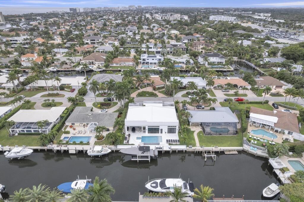 923 Eve Street Delray Beach, FL 33483 - Photo 55 of 69 an aerial view of a house with a lake view