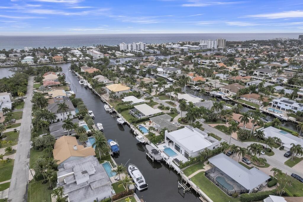 923 Eve Street Delray Beach, FL 33483 - Photo 56 of 69 an aerial view of a city with lots of residential buildings