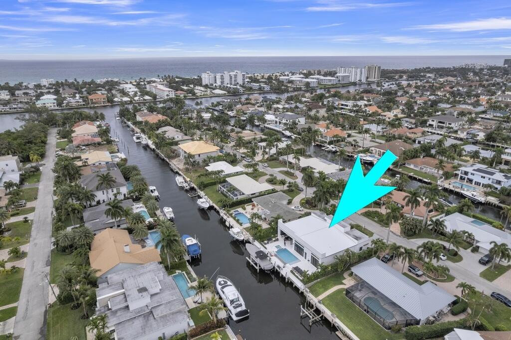 923 Eve Street Delray Beach, FL 33483 - Photo 67 of 69 an aerial view of a city with lots of residential buildings