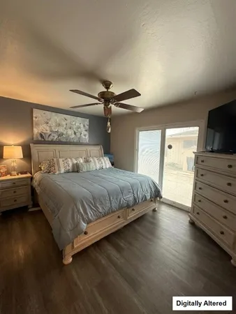 a bedroom with a bed and furniture