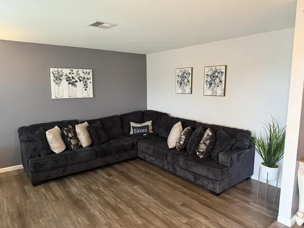 a living room with furniture and a couch