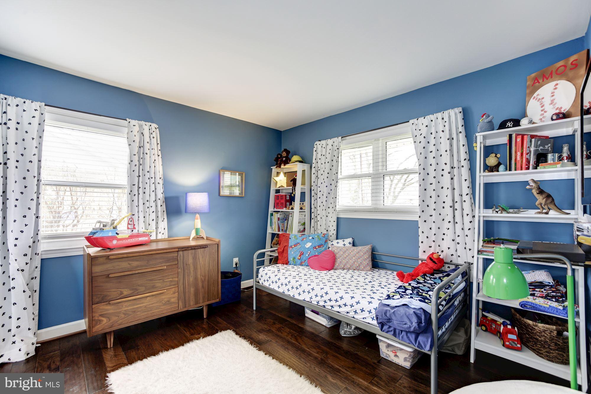 7414 Axton Street Springfield, VA 22151 - Photo 18 of 30 a bedroom with bed and a window