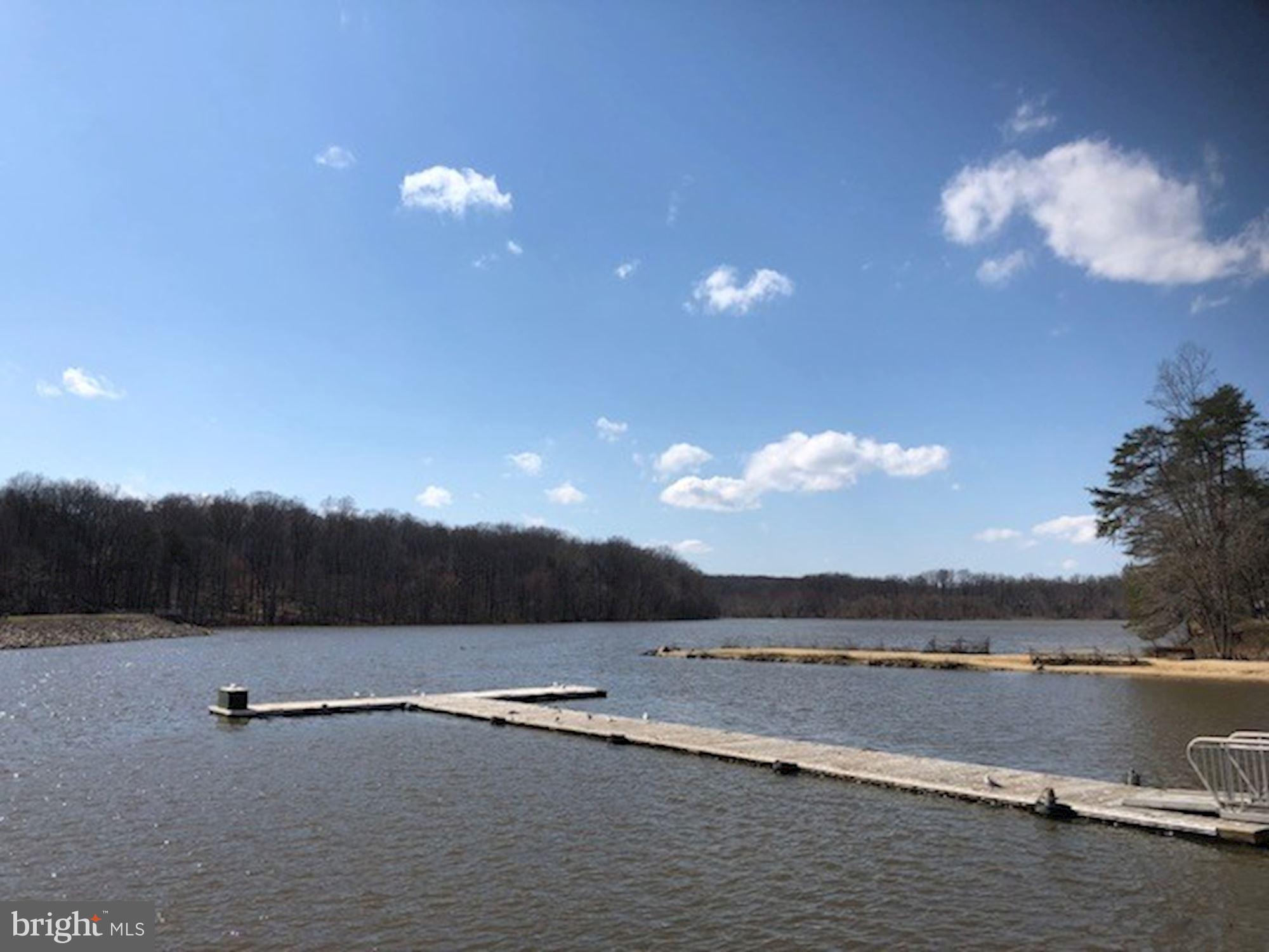 7414 Axton Street Springfield, VA 22151 - Photo 28 of 30 a view of a lake with island in background
