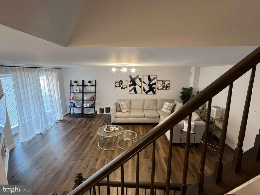 3650 Marcey Creek Road Laurel, MD 20724 - Photo 7 of 10 a view of a livingroom with furniture and stairs
