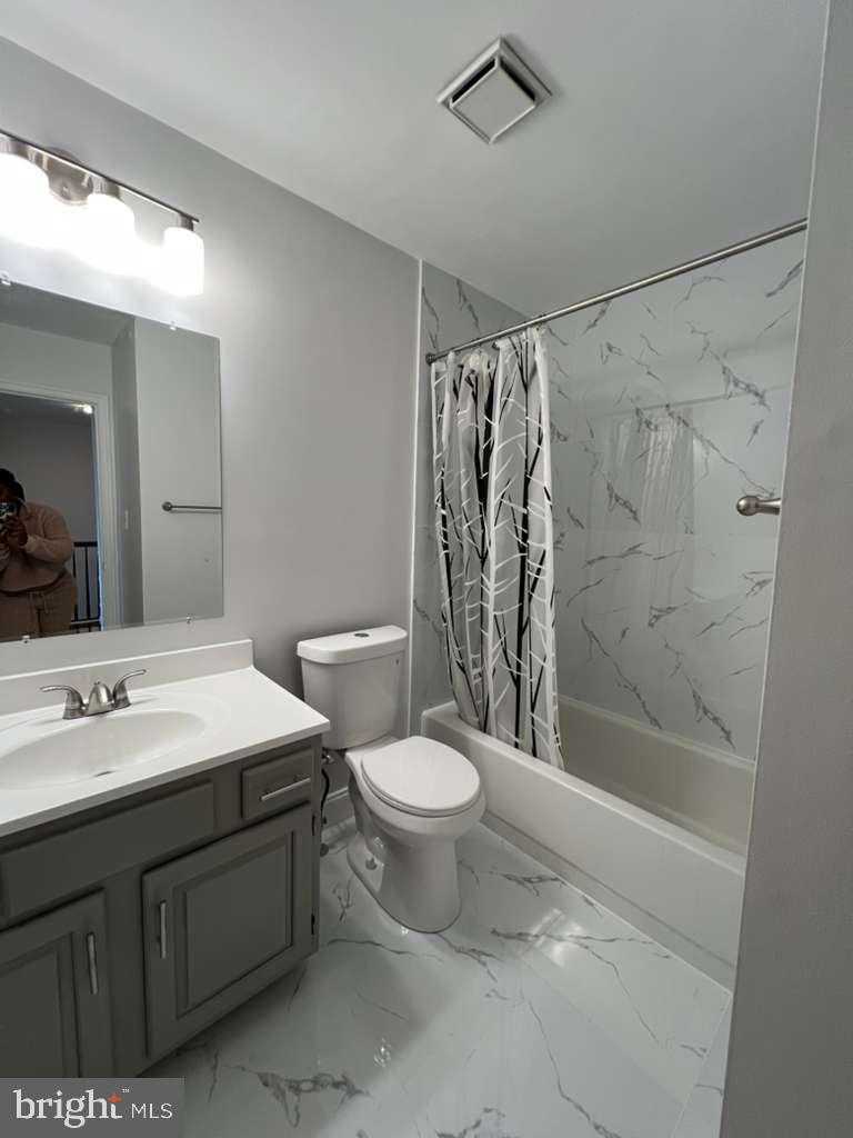 3650 Marcey Creek Road Laurel, MD 20724 - Photo 9 of 10 a bathroom with a sink and a mirror