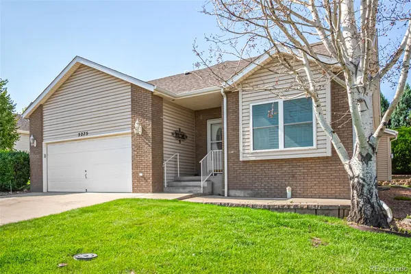 front view of house with a yard