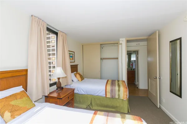 a bed room with a bed and a couch