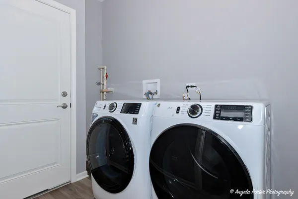 a utility room with dryer and washer