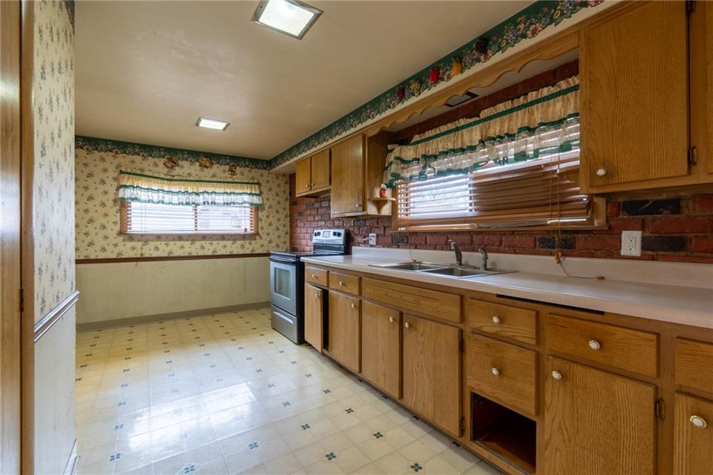 3532 3rd Beaver Falls Koppel, PA 16136 - Photo 4 of 14 a kitchen with sink and window