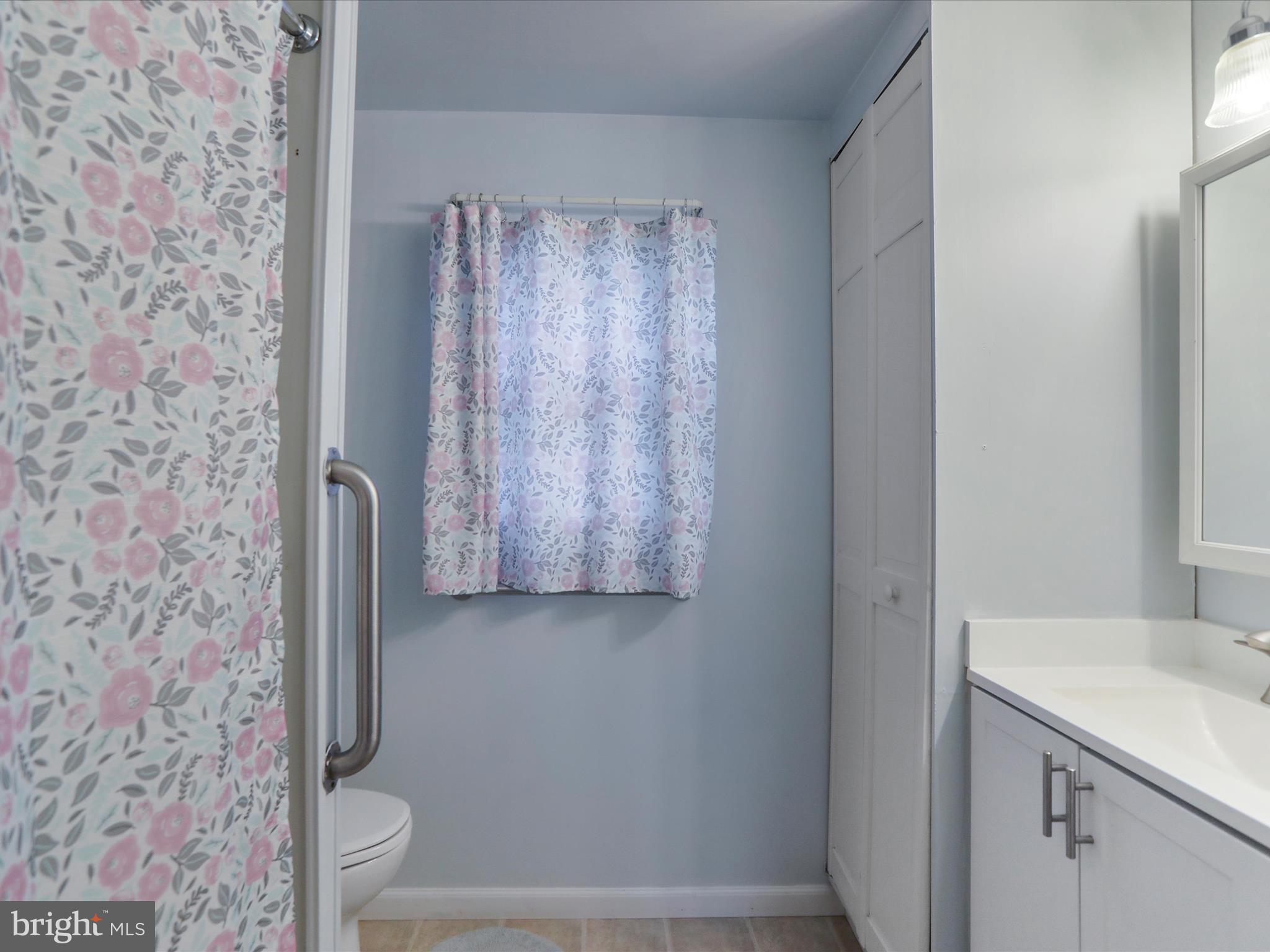 18540 Brooke Road Sandy Spring, MD 20860 - Photo 18 of 39 a bathroom with a toilet and a sink